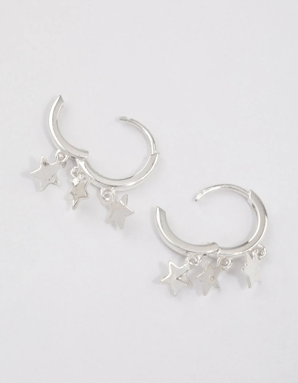 Sterling Silver Trio Star Huggie Earrings - Image 2
