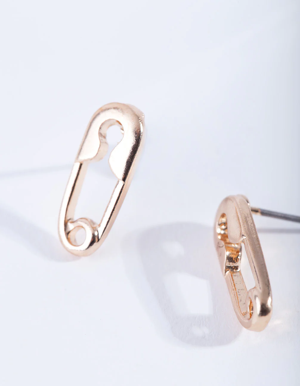 Gold Mini Safety Pin Stud Earrings - Image 2