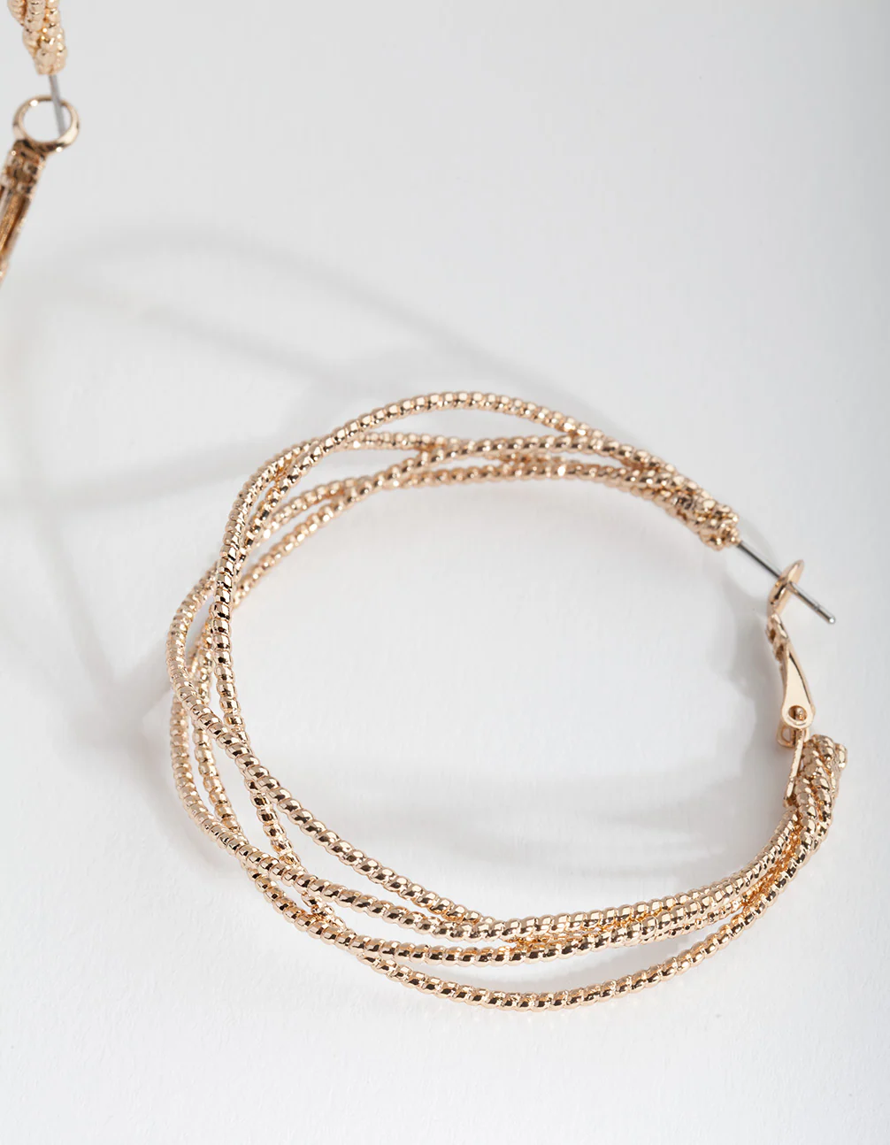 Gold Crossover Multi Hoop Earrings - Image 3