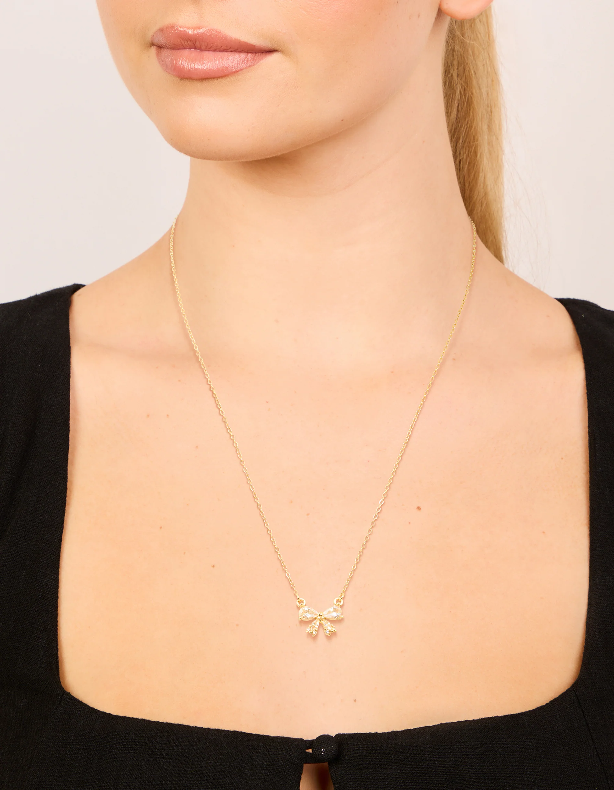 Waterproof Gold Plated Stainless Steel Cubic Zirconia Bow Pendant Necklace - Image 2