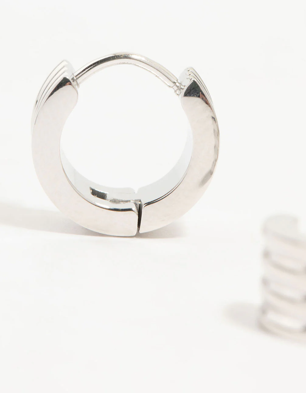 Waterproof Stainless Steel Ribbed Huggie Earrings - Image 4